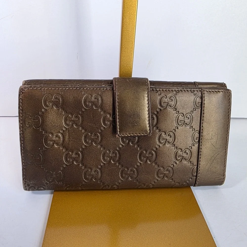 Gucci Embossed Brown Leather Wallet - Picture 1 of 7